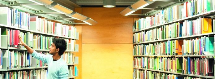 A man in an academic library