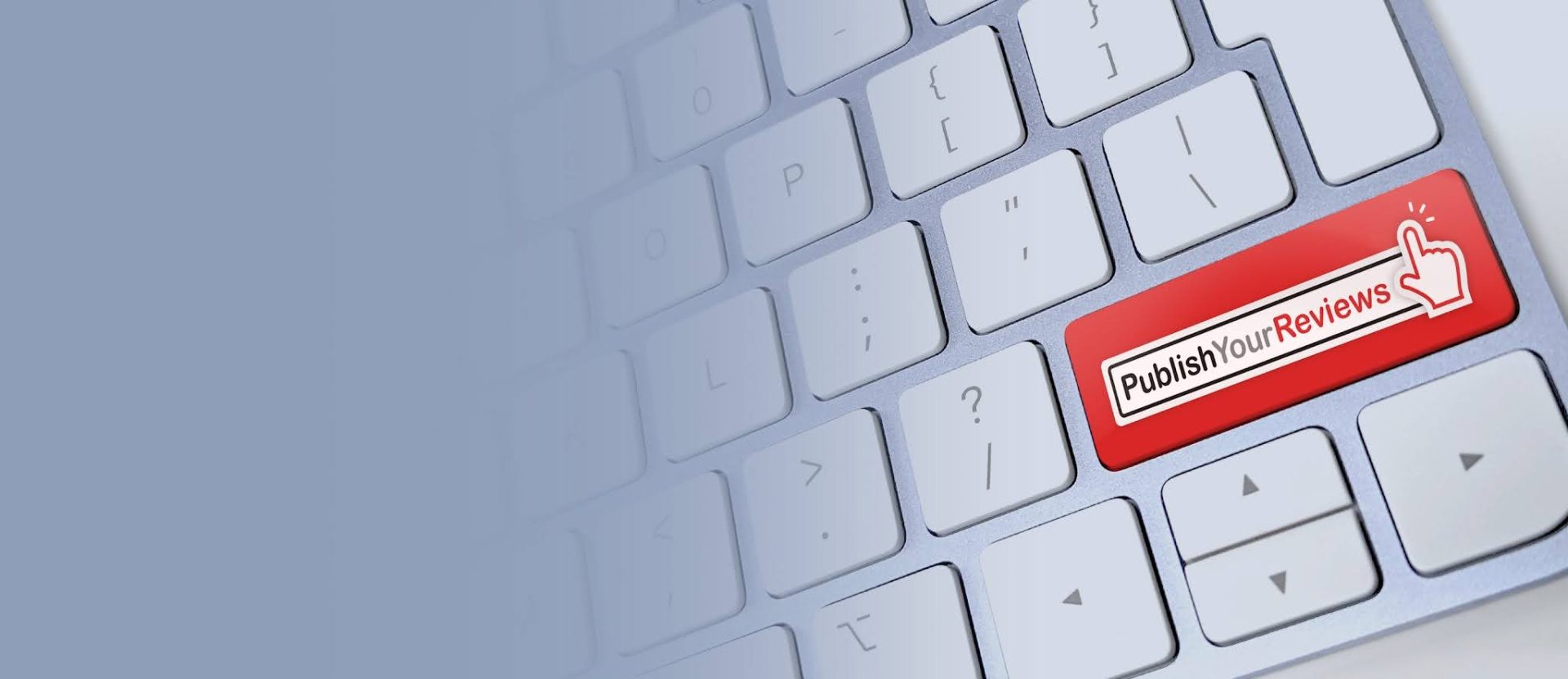 Close-up of a keyboard with a red key labeled Publish Your Reviews on the right side. The key has a hand cursor icon, suggesting interaction. The rest of the keyboard is in light gray.