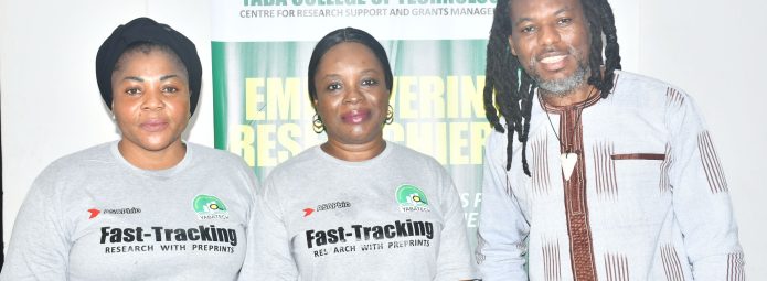 Three people stand in front of a Yaba College of Technology banner. Two women on the left wear Fast-Tracking Research with Preprints t-shirts, and a man on the right wears a patterned shirt. They are smiling and posing for the photo.