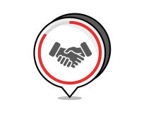 Icon of two hands shaking inside a circular location marker with a red outline, symbolizing agreement or partnership.